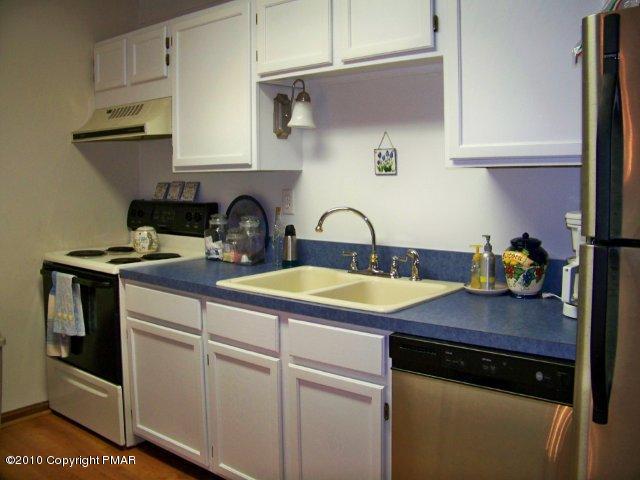 F2 Monomonock Road Cresco, PA 18326 - Photo 4 of 13 a kitchen with a sink and cabinets