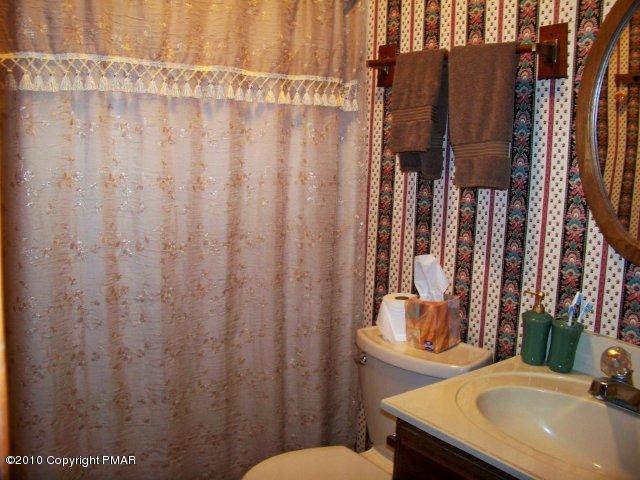 F2 Monomonock Road Cresco, PA 18326 - Photo 8 of 13 a bathroom with a sink toilet and shower