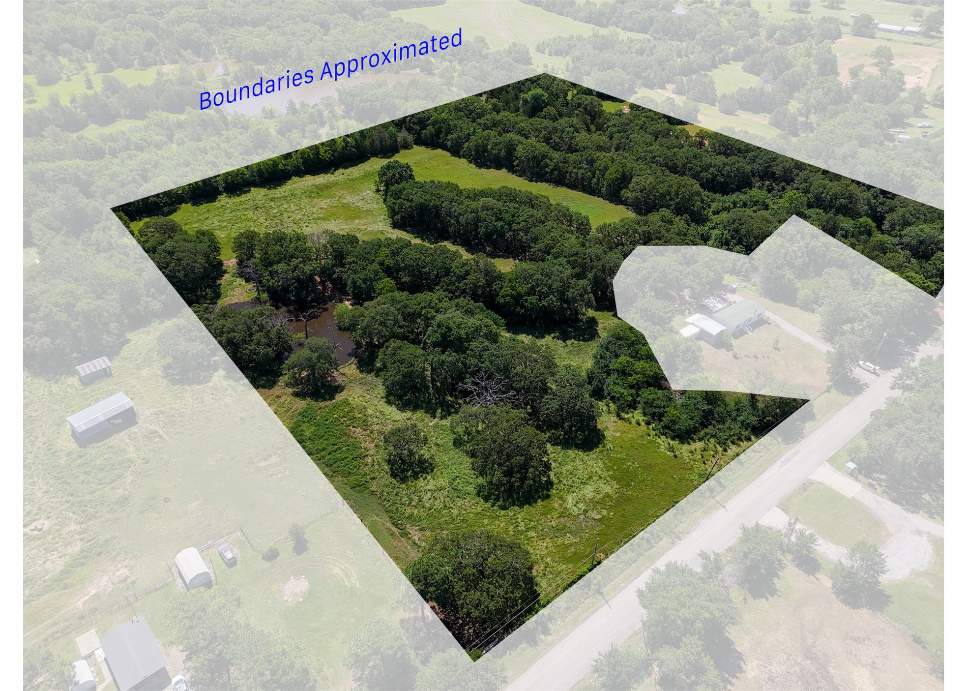0 Harvey Road Ardmore, OK 73401 - Photo 1 of 10 Expansive treed acreage with open pasture areas and a natural pond