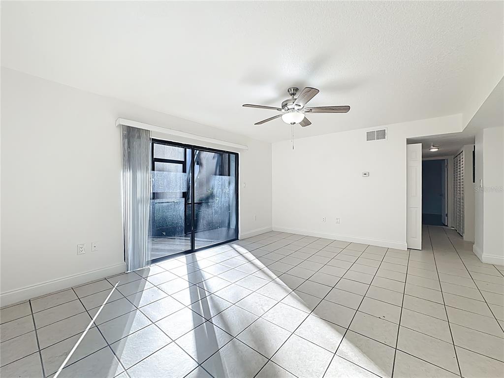 185 Waterfall Way, Unit 102 Altamonte Springs, FL 32714 - Photo 13 of 59 a view of an empty room and window