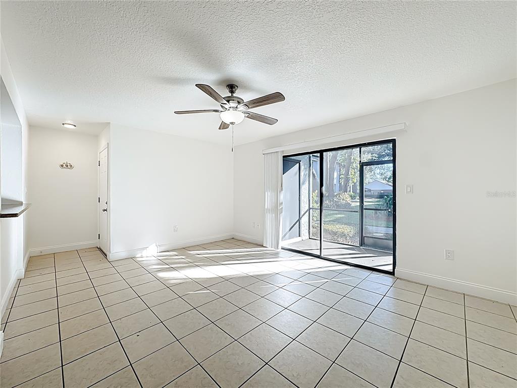 185 Waterfall Way, Unit 102 Altamonte Springs, FL 32714 - Photo 14 of 59 a view of an empty room and window