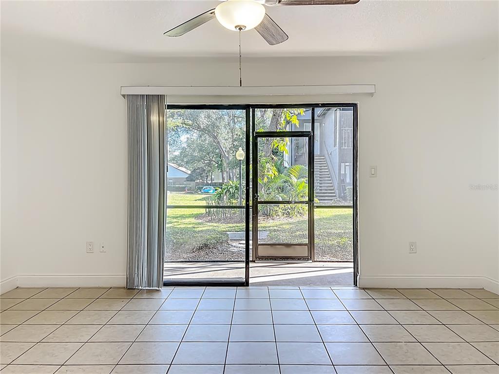 185 Waterfall Way, Unit 102 Altamonte Springs, FL 32714 - Photo 18 of 59 a view of an empty room and window