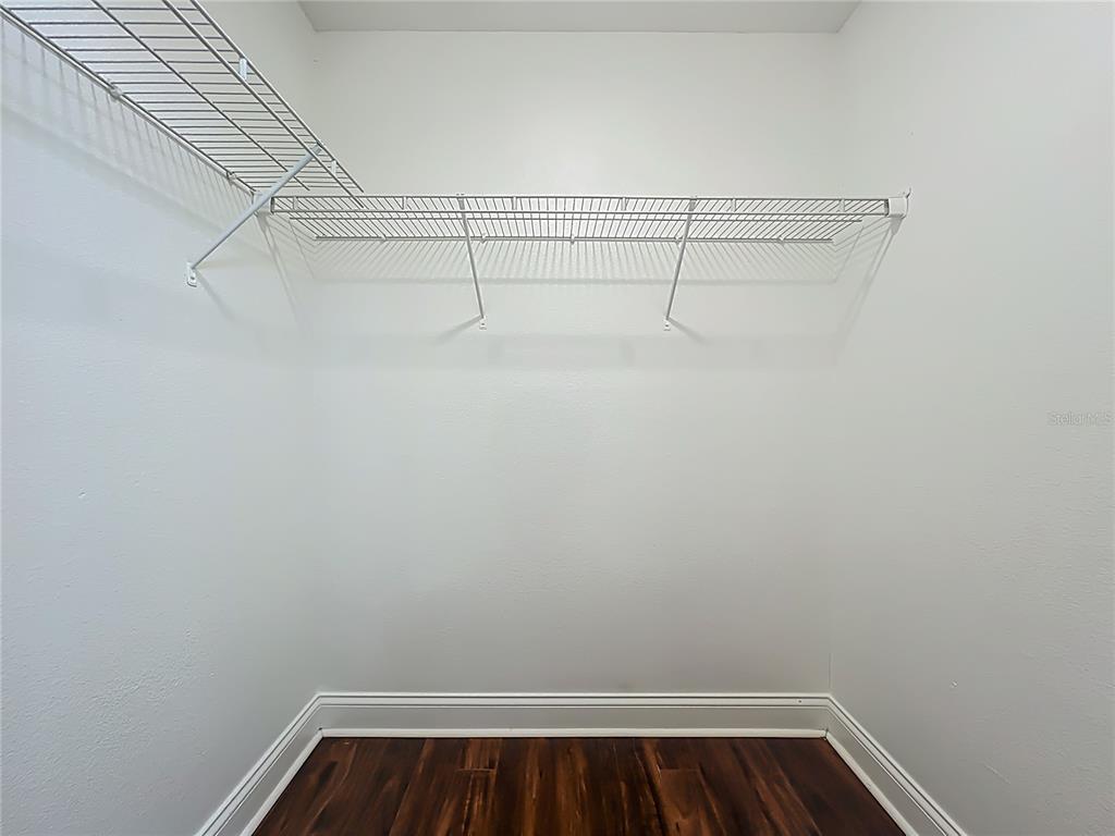 185 Waterfall Way, Unit 102 Altamonte Springs, FL 32714 - Photo 43 of 59 a view of small space with racks on the wall