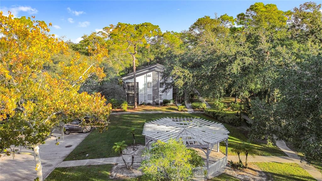 185 Waterfall Way, Unit 102 Altamonte Springs, FL 32714 - Photo 54 of 59 a swimming pool with outdoor seating and yard