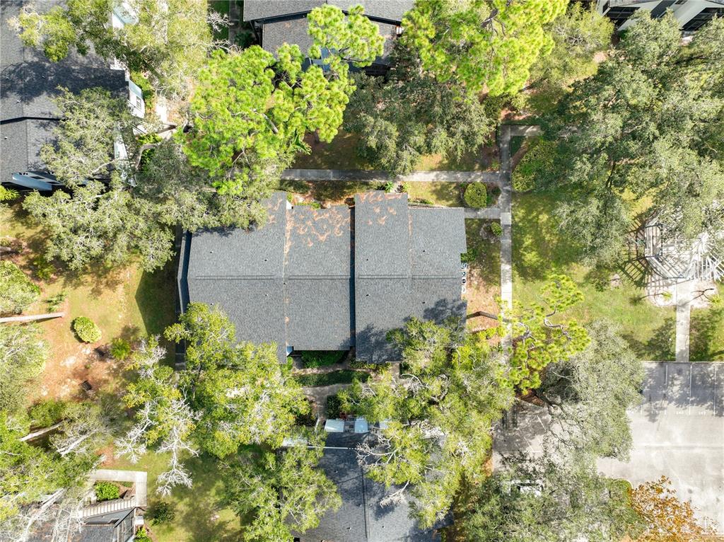 185 Waterfall Way, Unit 102 Altamonte Springs, FL 32714 - Photo 55 of 59 a backyard of a house with lots of green space