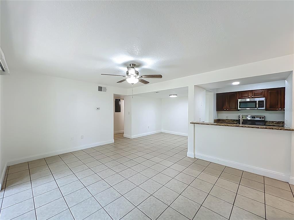 185 Waterfall Way, Unit 102 Altamonte Springs, FL 32714 - Photo 6 of 59 a view of a livingroom with furniture