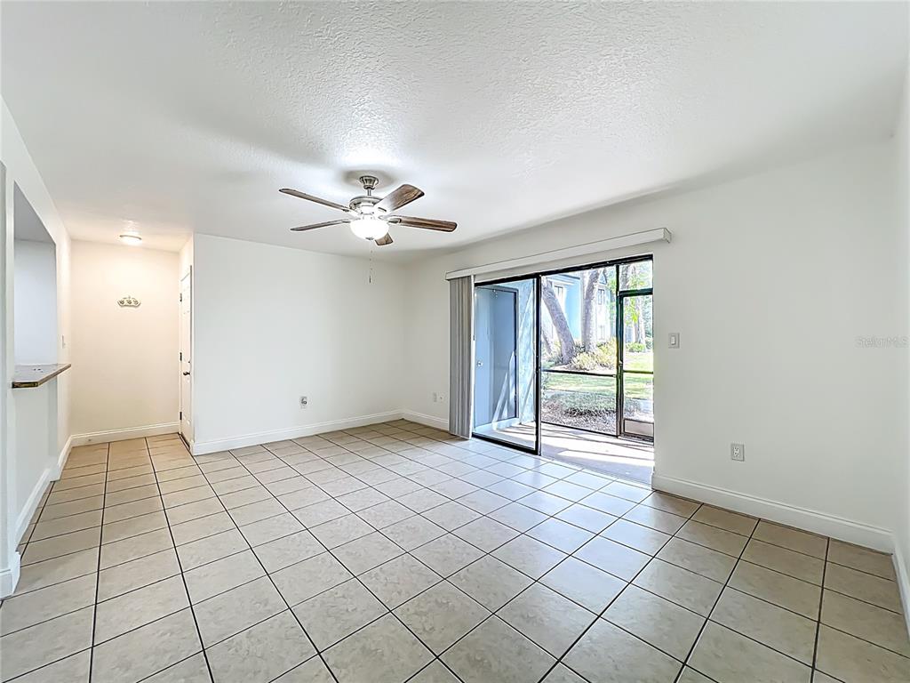 185 Waterfall Way, Unit 102 Altamonte Springs, FL 32714 - Photo 10 of 59 a view of an empty room and window