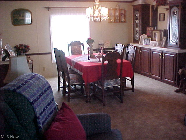 9060 West Ridge Road Elyria, OH 44035 - Photo 10 of 20 Open concept from living room to formal dining room.