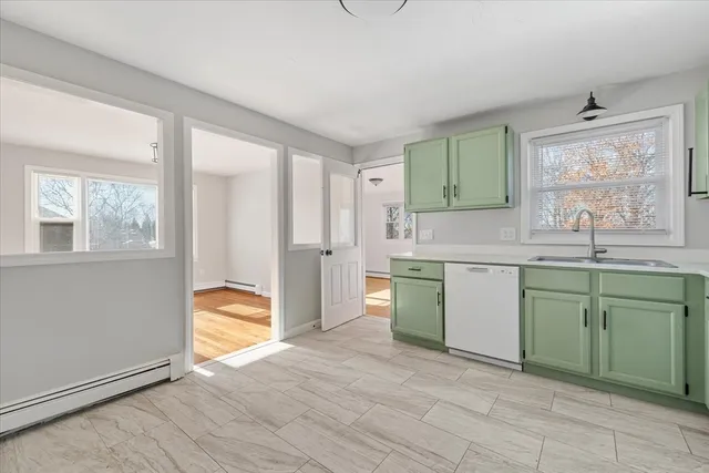 a kitchen with a sink and cabinets