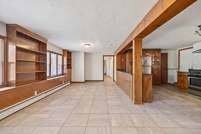 a view of a hallway with an entryway