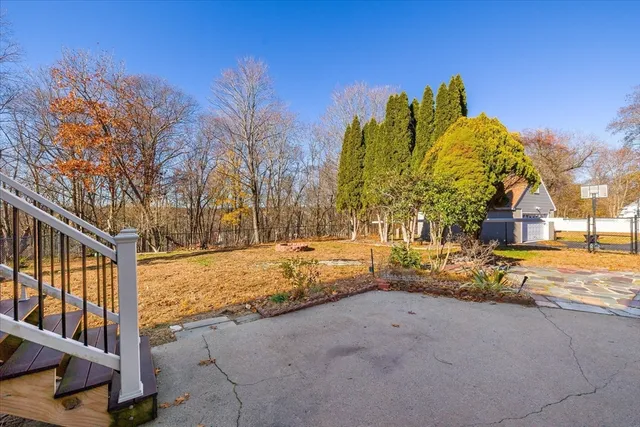 a view of a house with snow on the road