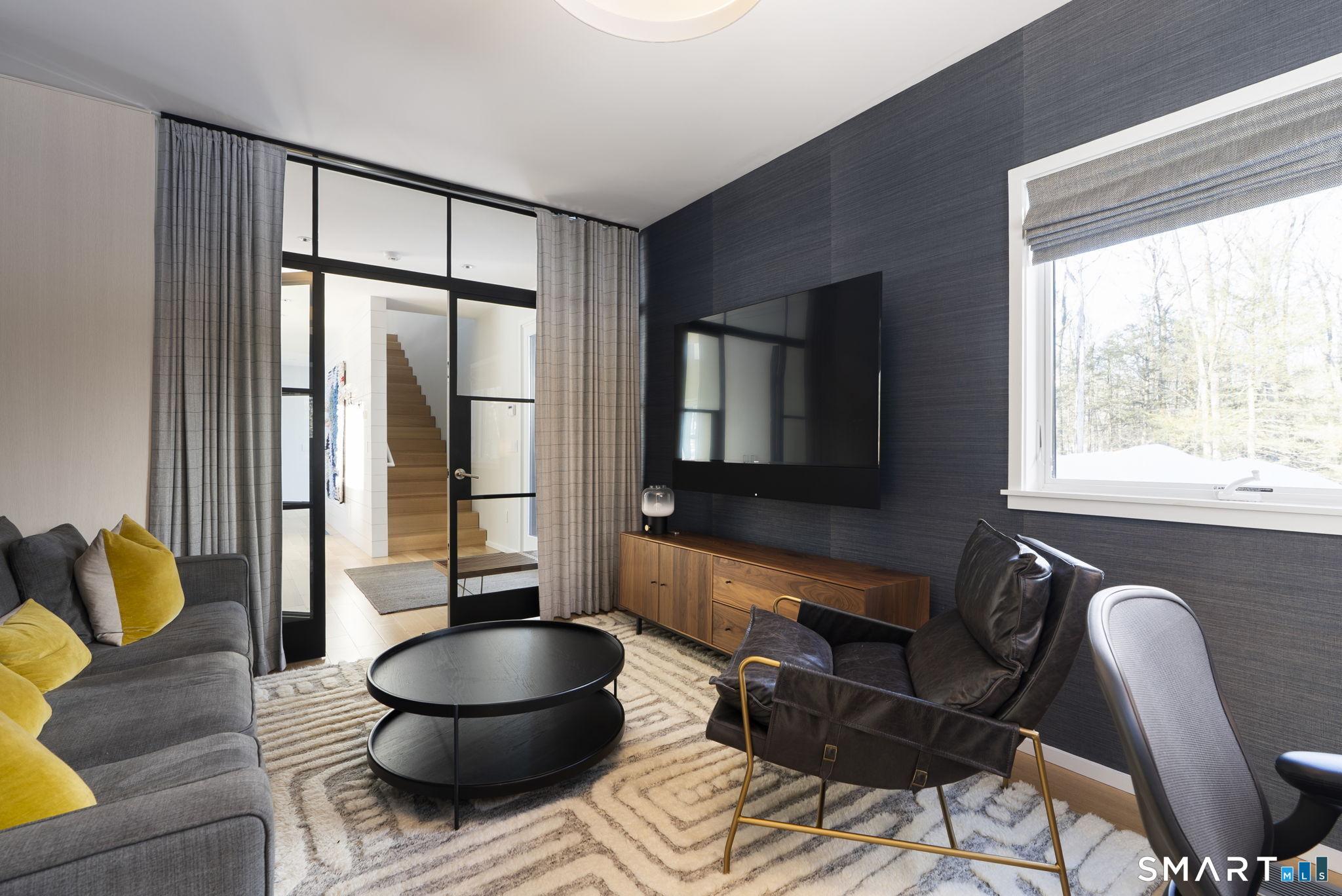 60 Selleck Hill Road Salisbury, CT 06068 - Photo 11 of 32 a living room with furniture and a large window