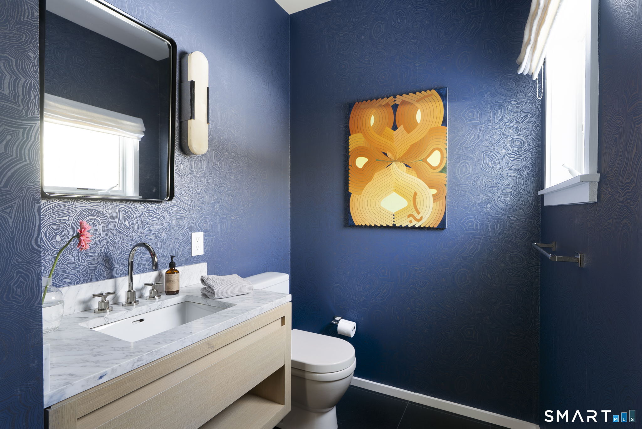 60 Selleck Hill Road Salisbury, CT 06068 - Photo 13 of 32 a bathroom with a toilet sink and mirror