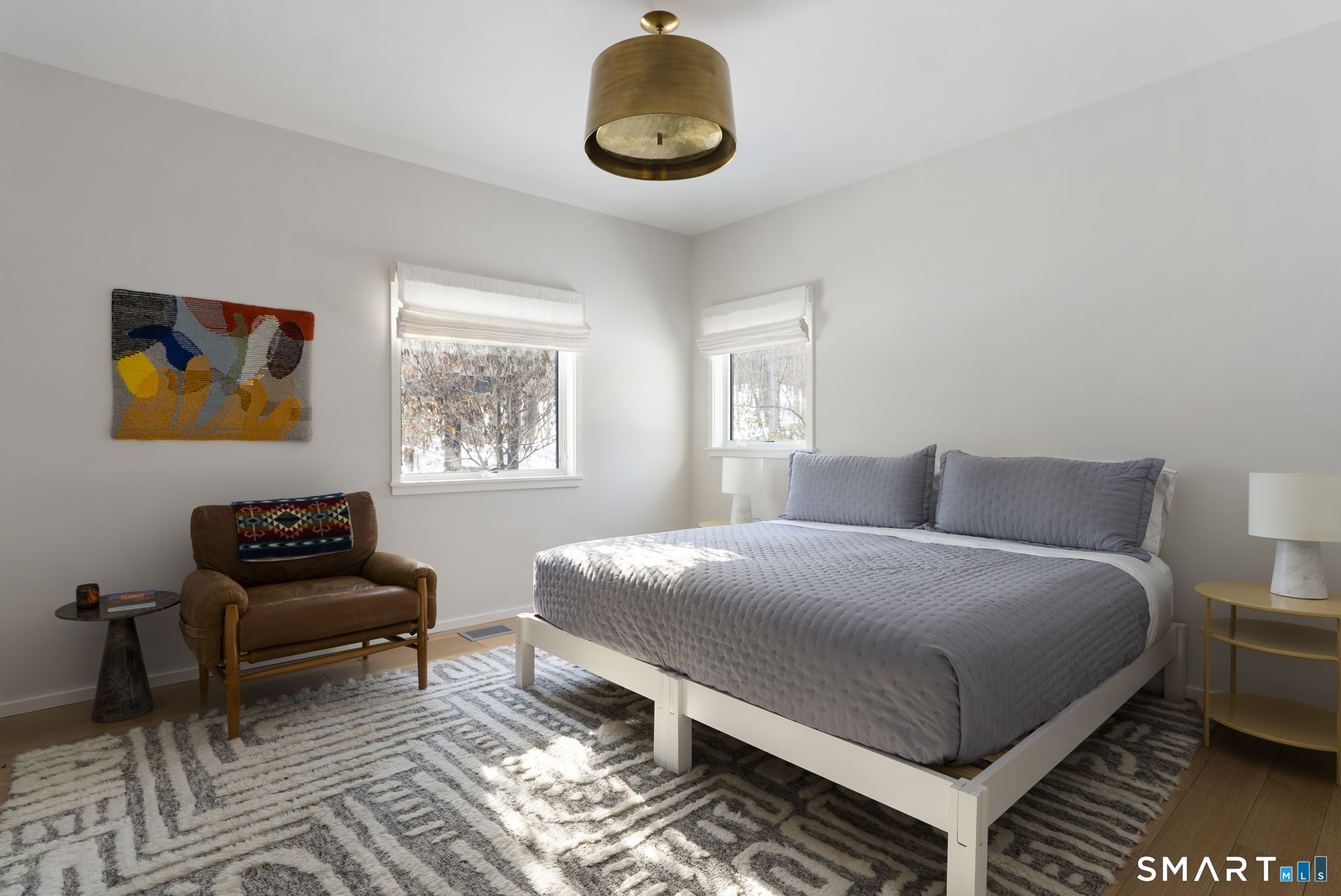 60 Selleck Hill Road Salisbury, CT 06068 - Photo 14 of 32 a bedroom with a bed and a couch