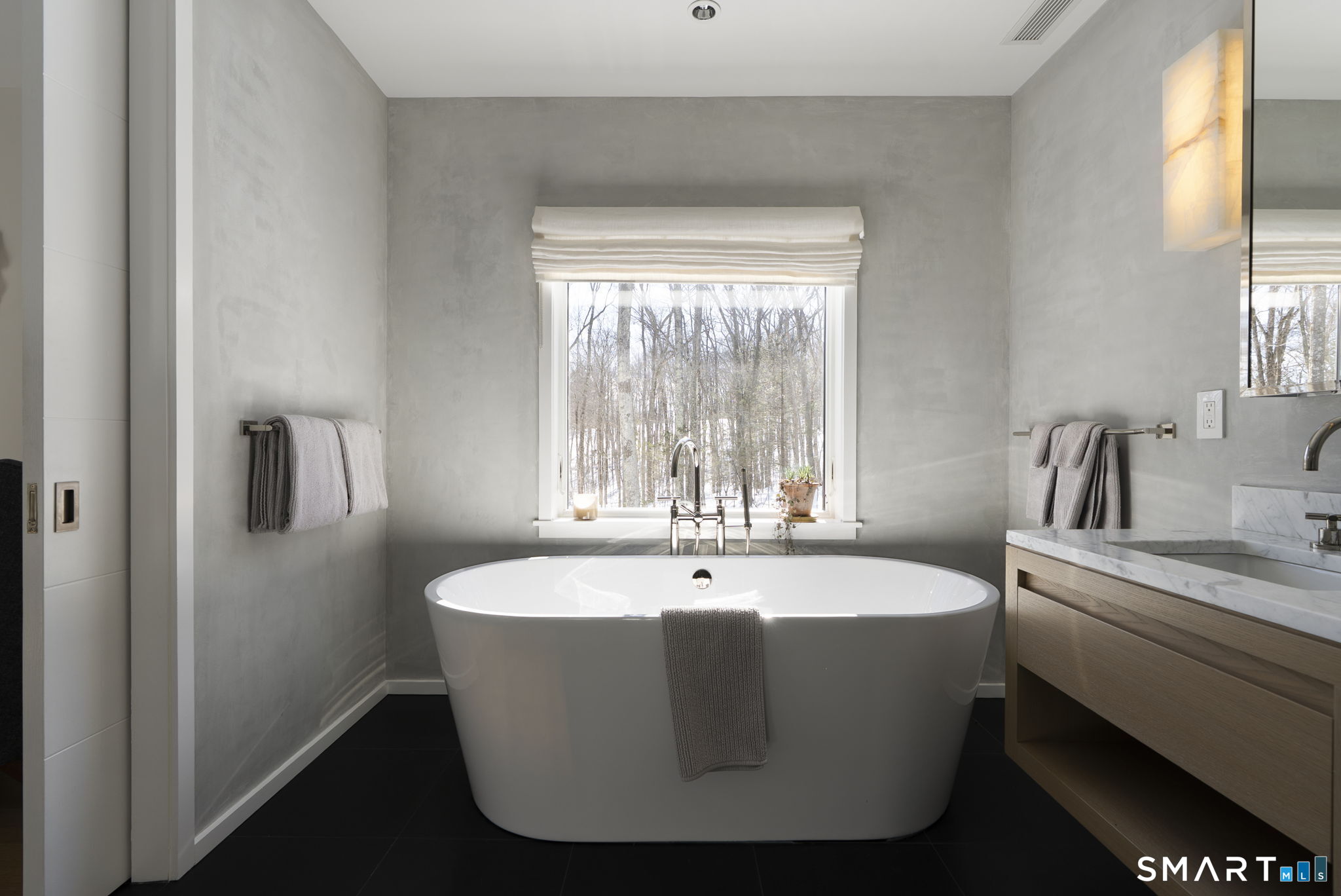 60 Selleck Hill Road Salisbury, CT 06068 - Photo 23 of 32 a white bath tub sitting in a bathroom