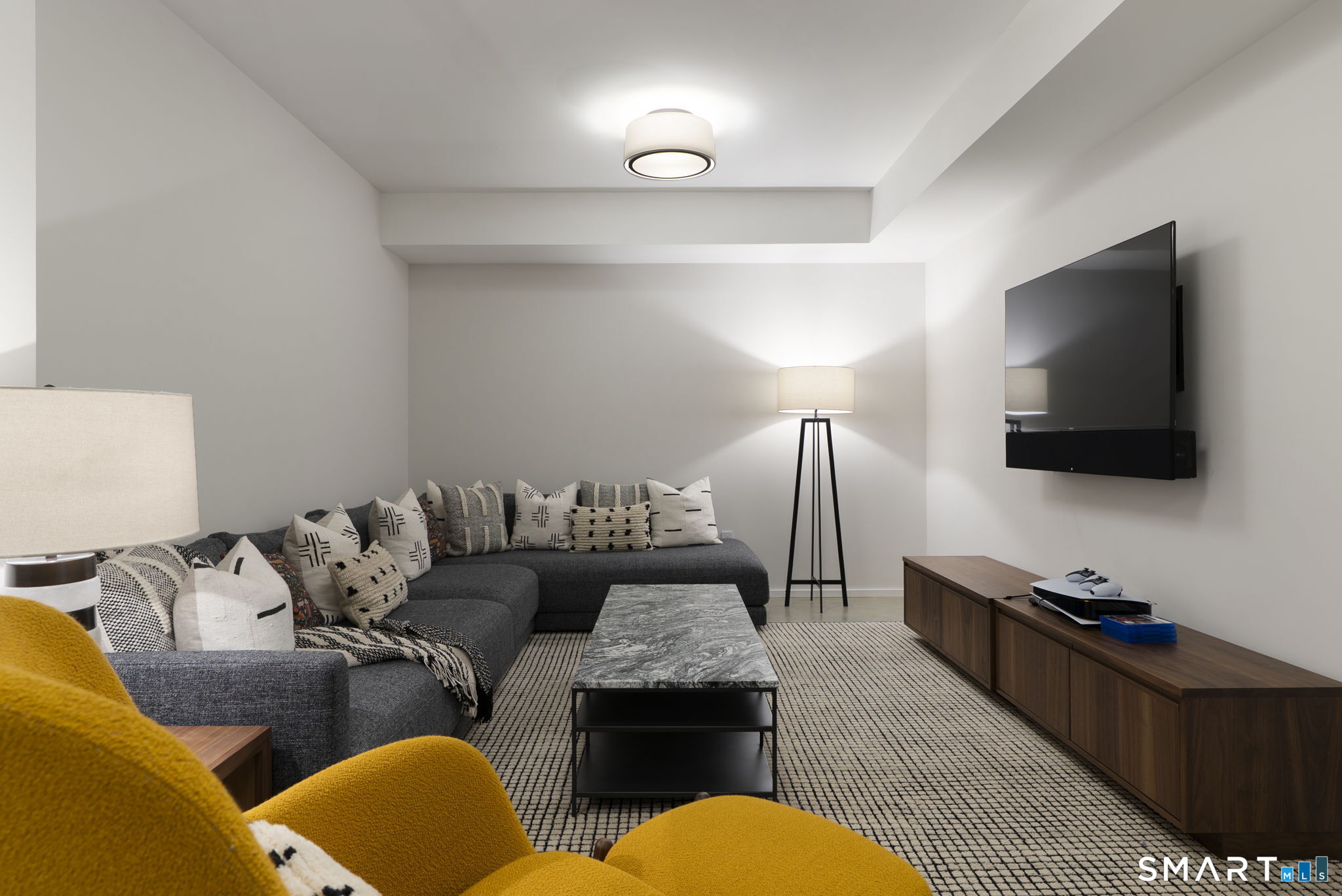 60 Selleck Hill Road Salisbury, CT 06068 - Photo 24 of 32 a living room with furniture and a flat screen tv