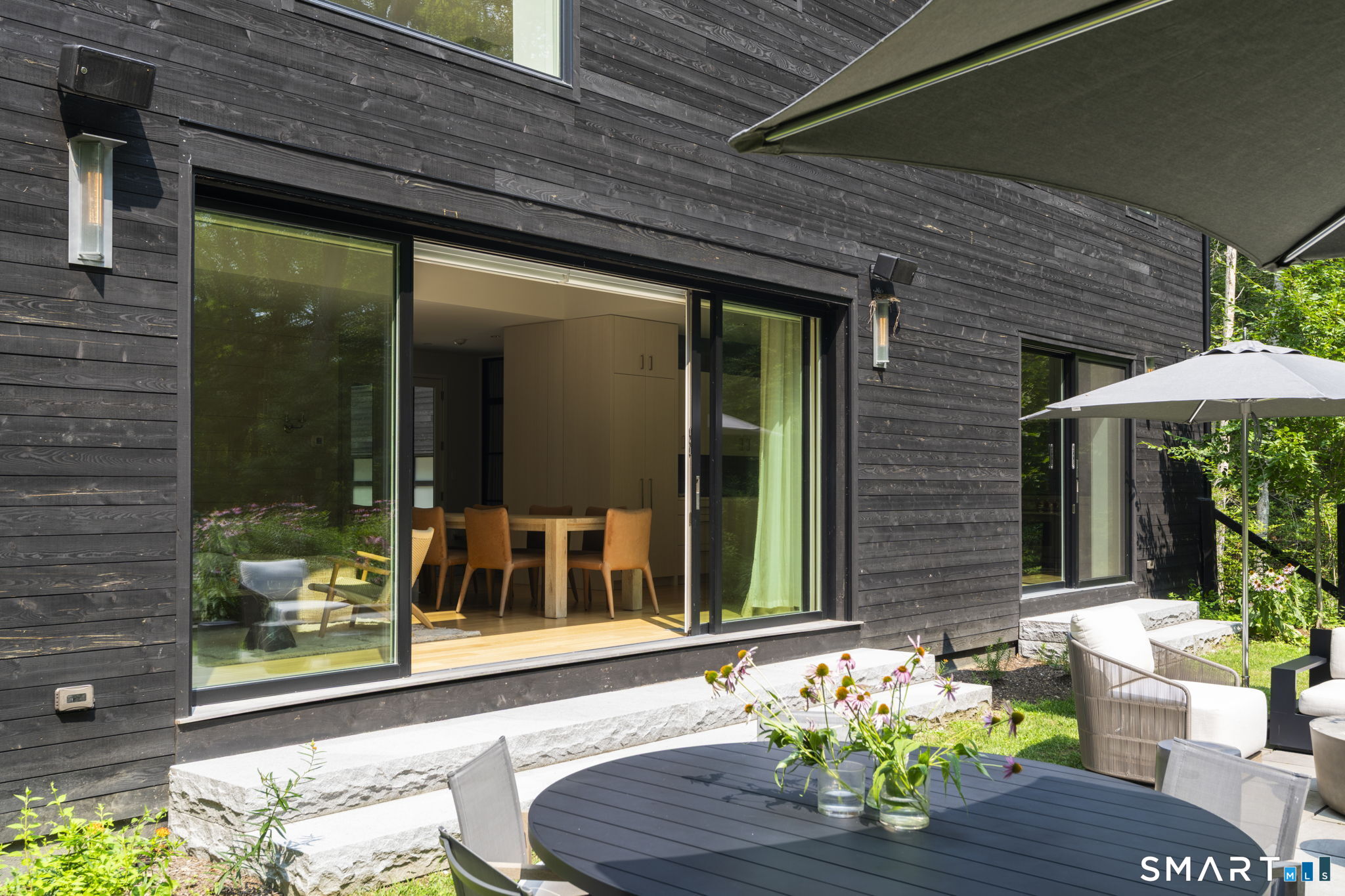 60 Selleck Hill Road Salisbury, CT 06068 - Photo 29 of 32 a front view of a house with outdoor seating