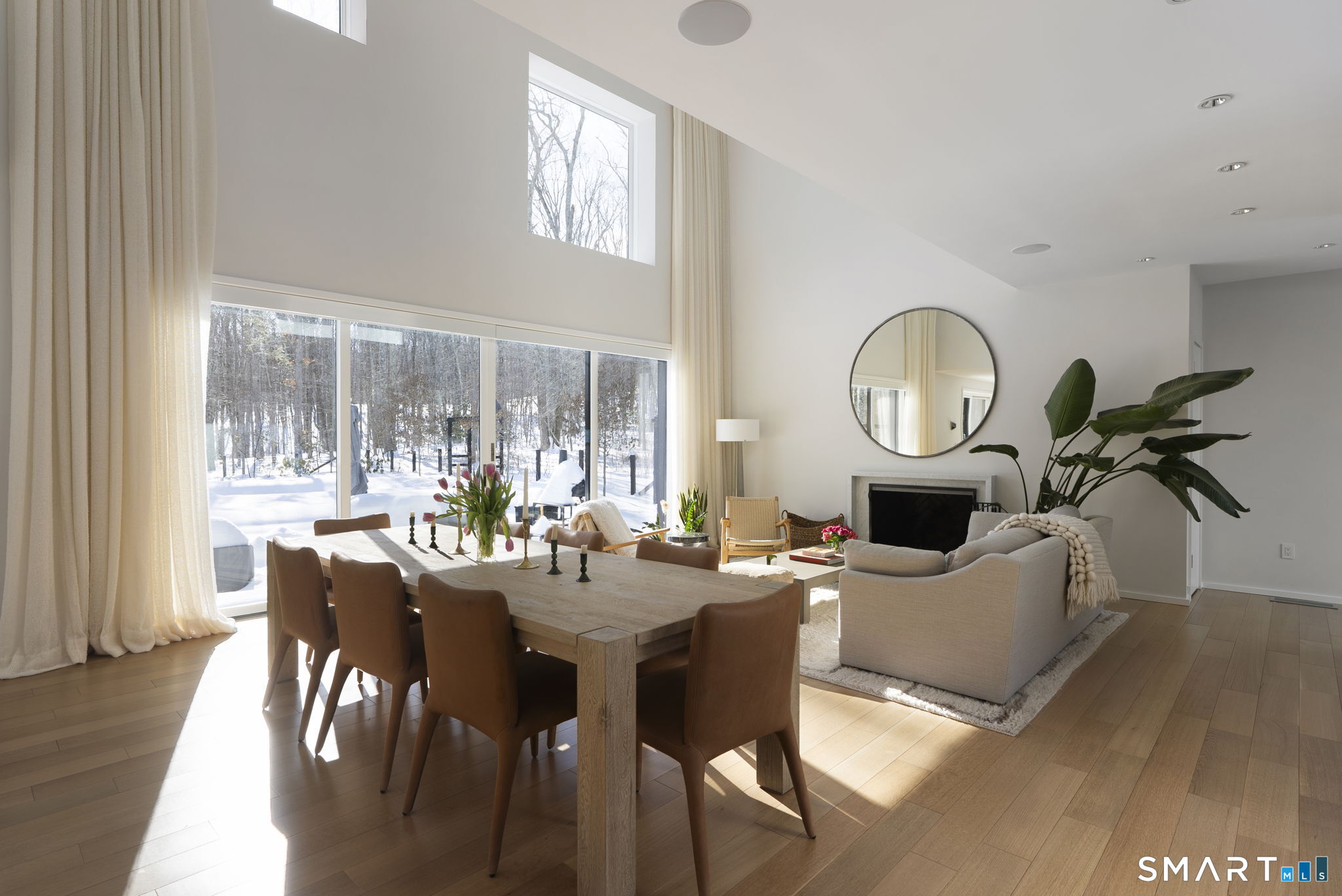 60 Selleck Hill Road Salisbury, CT 06068 - Photo 4 of 32 a view of a dining room with furniture a chandelier and wooden floor