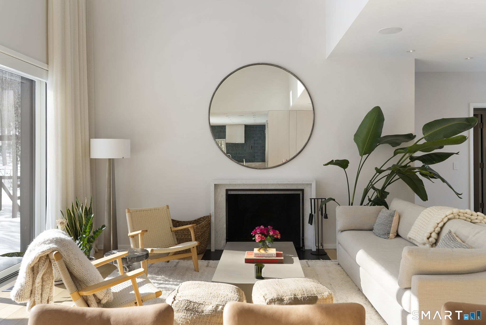 60 Selleck Hill Road Salisbury, CT 06068 - Photo 5 of 32 a living room with furniture a fireplace and a potted plant
