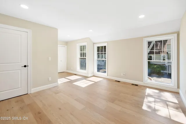 an empty room with windows