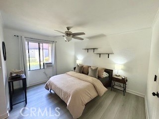 20702 El Toro, Unit 239 Lake Forest, CA 92630 - Photo 12 of 27 a bedroom with a bed and a window