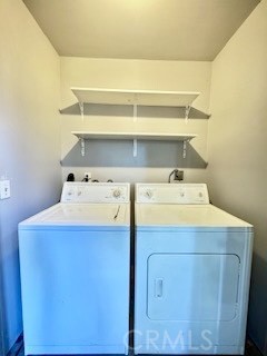 20702 El Toro, Unit 239 Lake Forest, CA 92630 - Photo 19 of 27 a utility room with dryer and washer