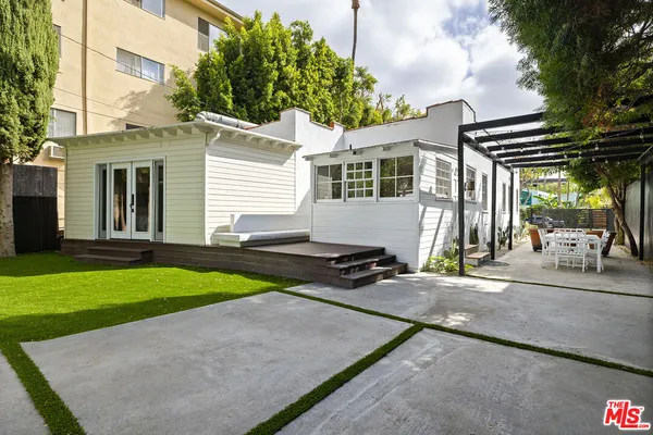 a house view with a garden space