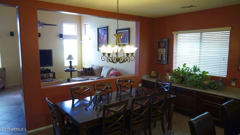 45401 Miramar Road Maricopa, AZ 85139 - Photo 8 of 44 45401WMiramarRdDiningRoomtableangle