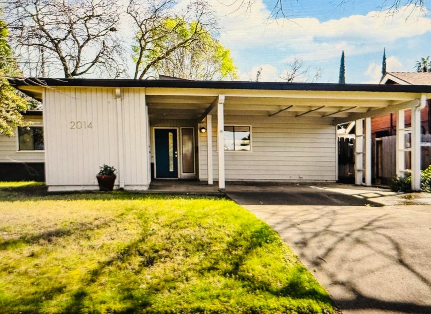 a view of a house with swimming pool