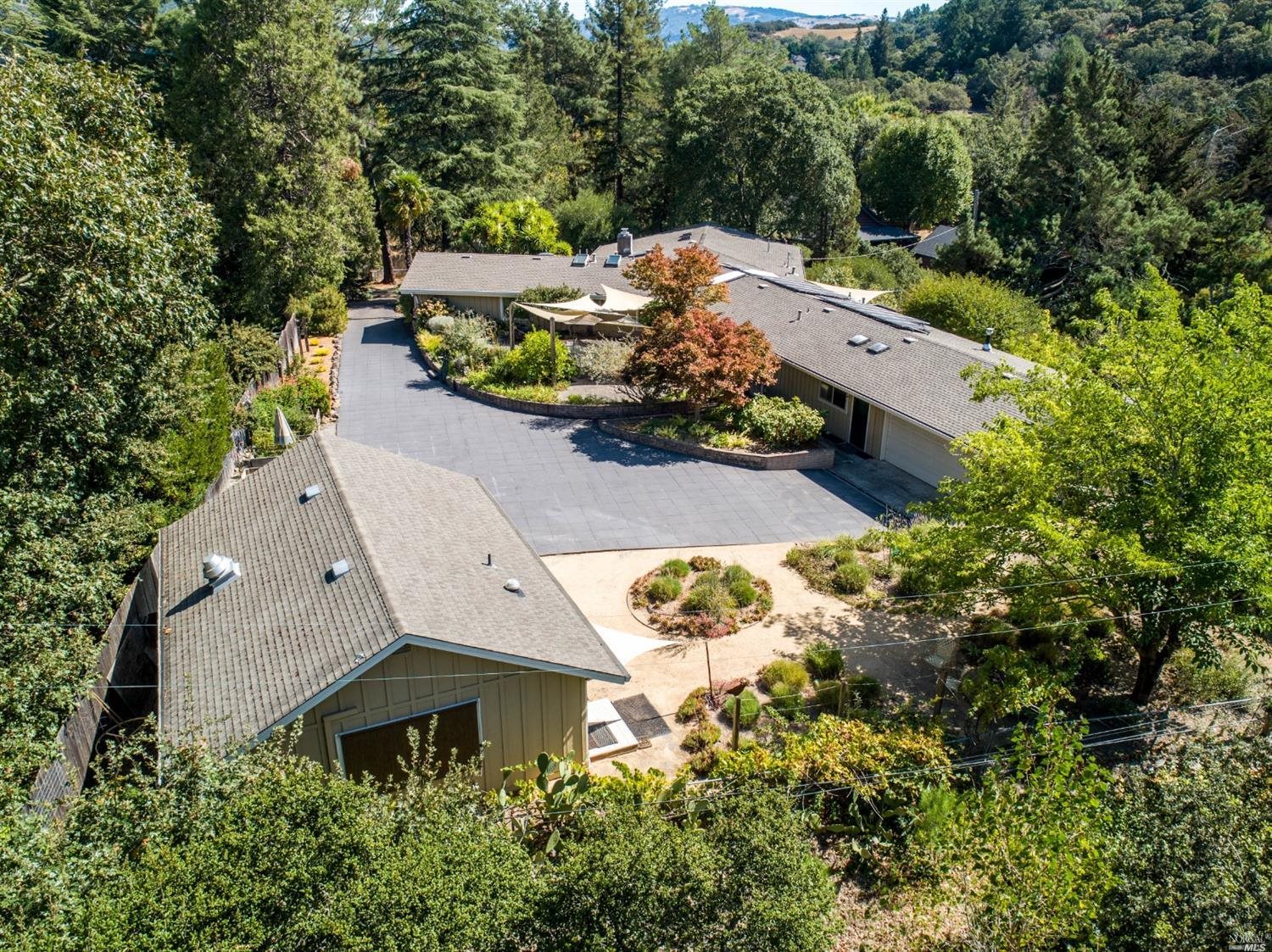 4317 Raymonde Way Santa Rosa, CA 95404 - Photo 1 of 1 an aerial view of a house with a yard and trees