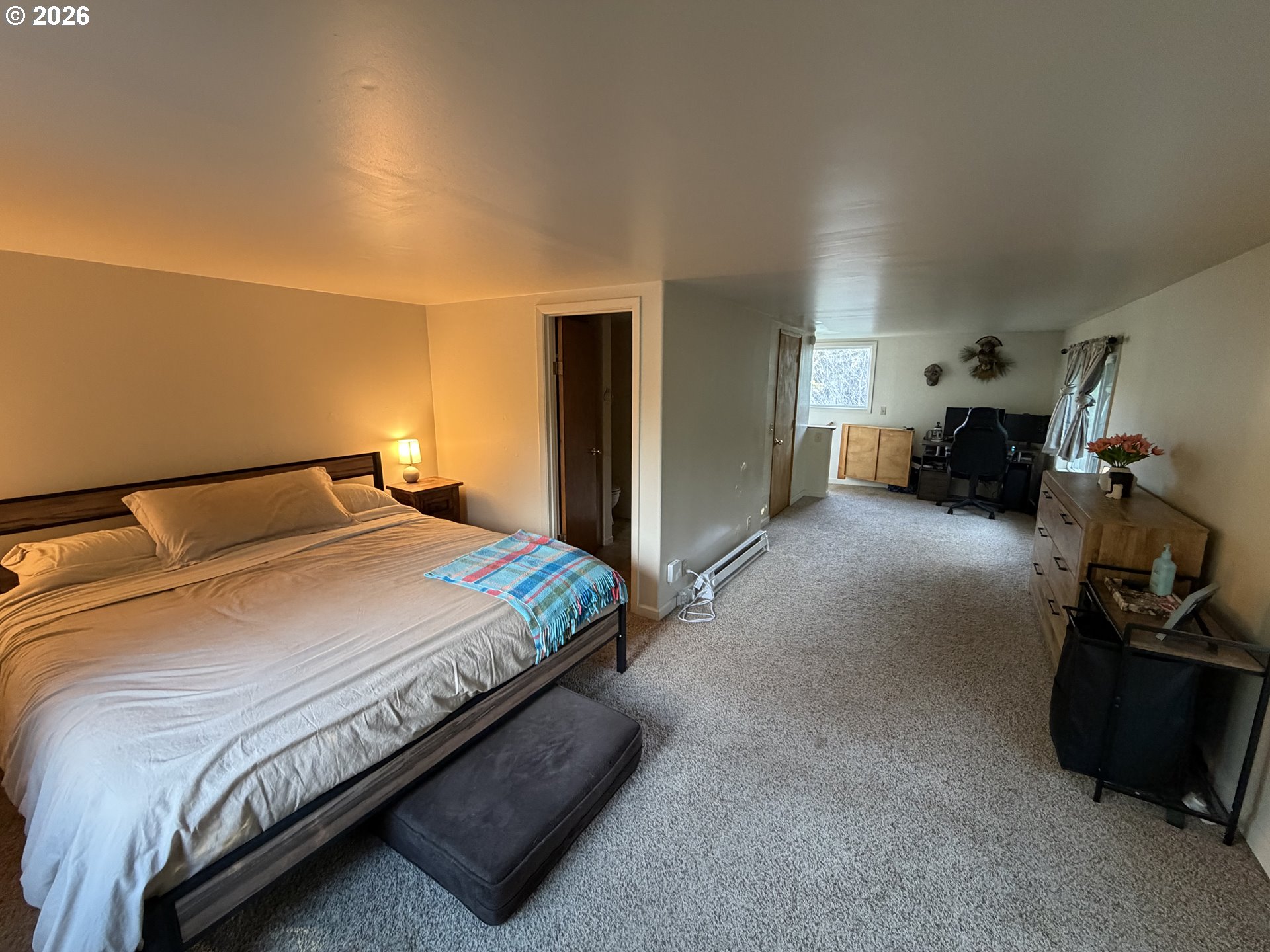 92738 Knapp Road Port Orford, OR 97465 - Photo 19 of 34 a bed room with a bed and a view of room