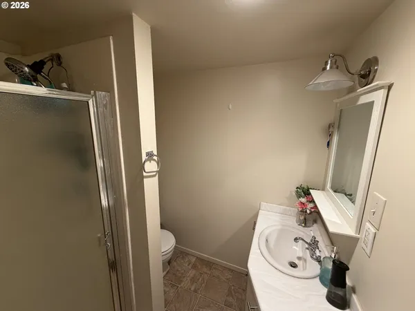 a bathroom with a sink and toilet