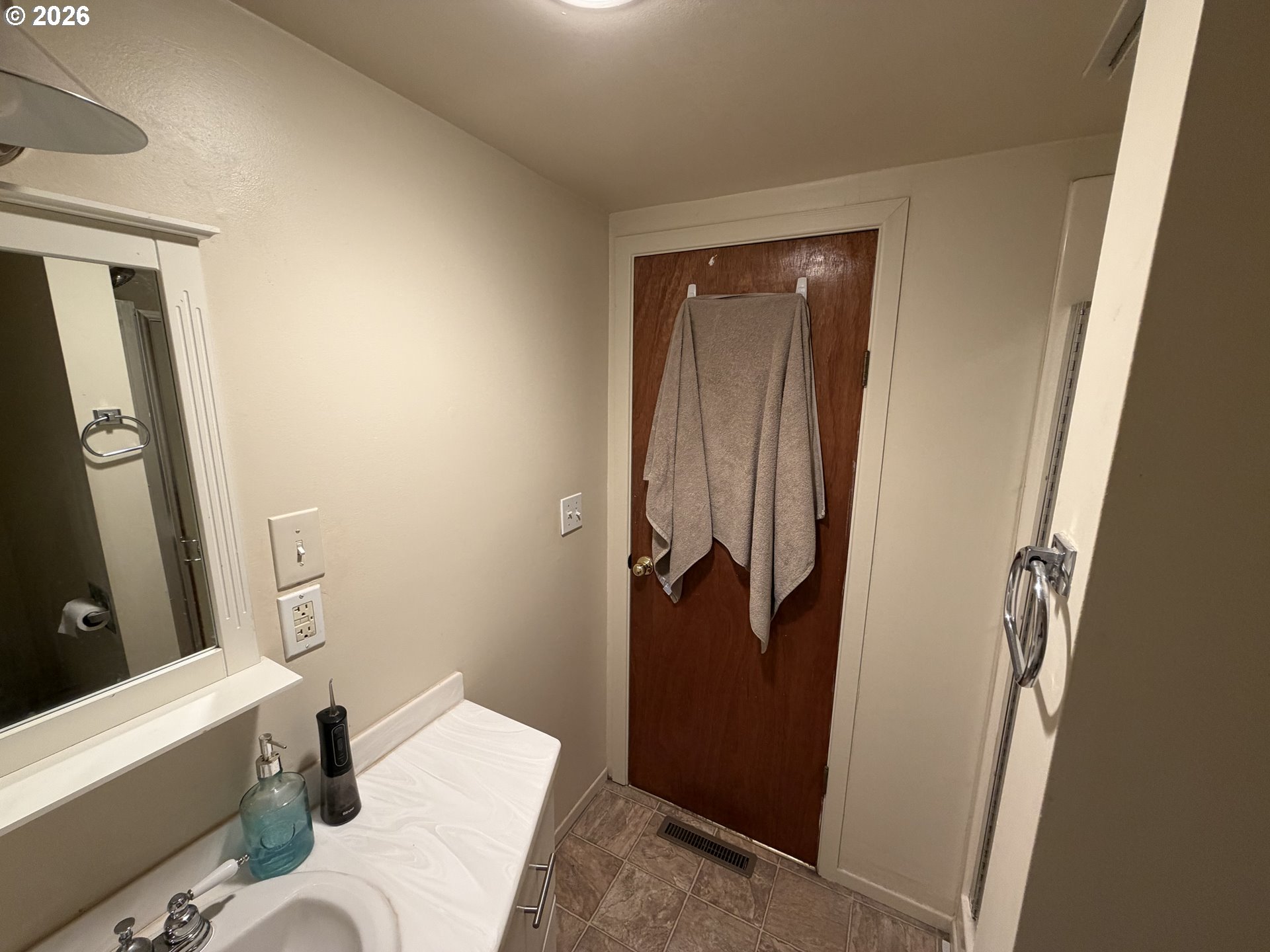 92738 Knapp Road Port Orford, OR 97465 - Photo 22 of 34 a bathroom with a sink and a mirror
