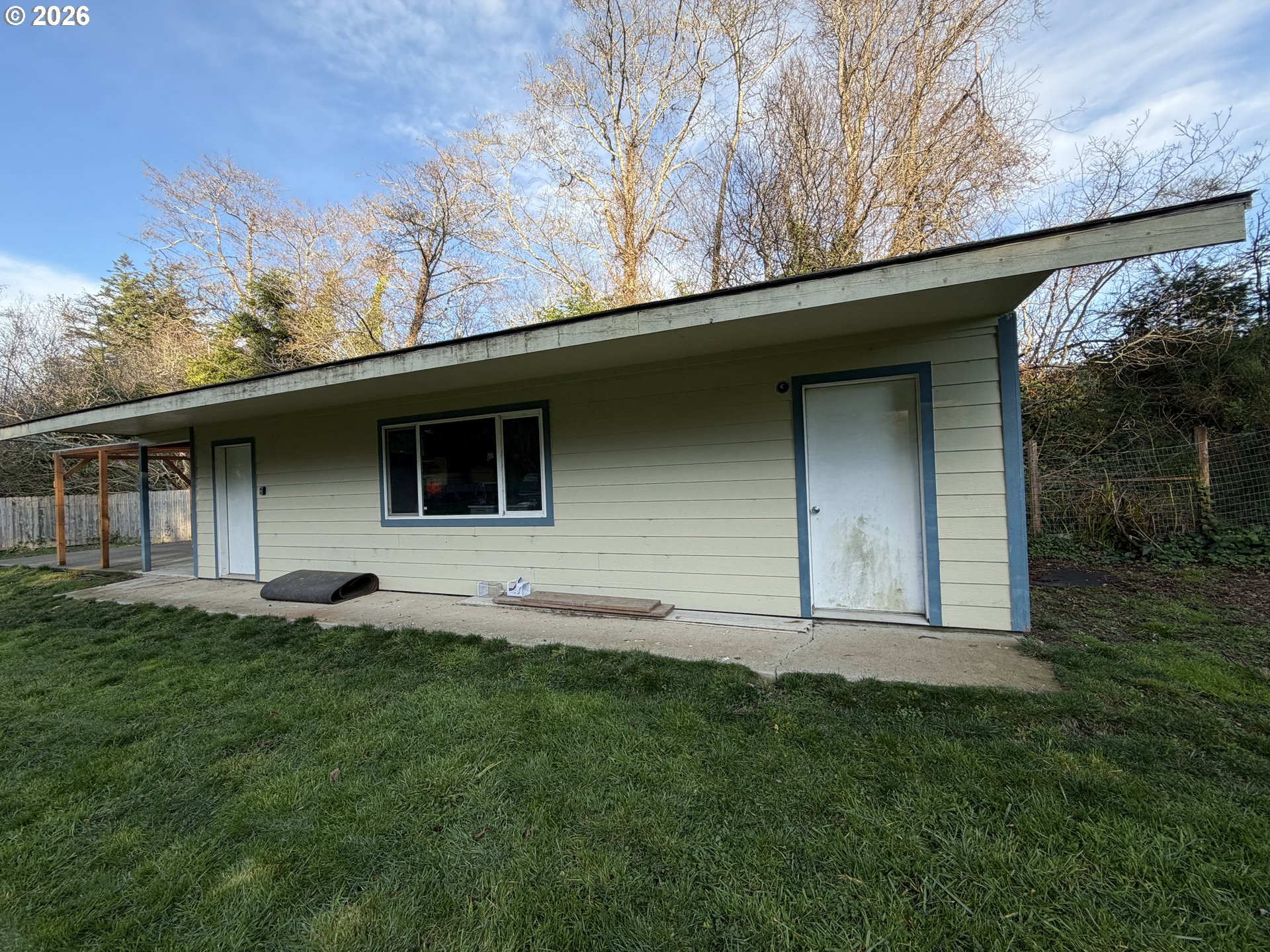 92738 Knapp Road Port Orford, OR 97465 - Photo 27 of 34 a backyard of a house with lots of green space