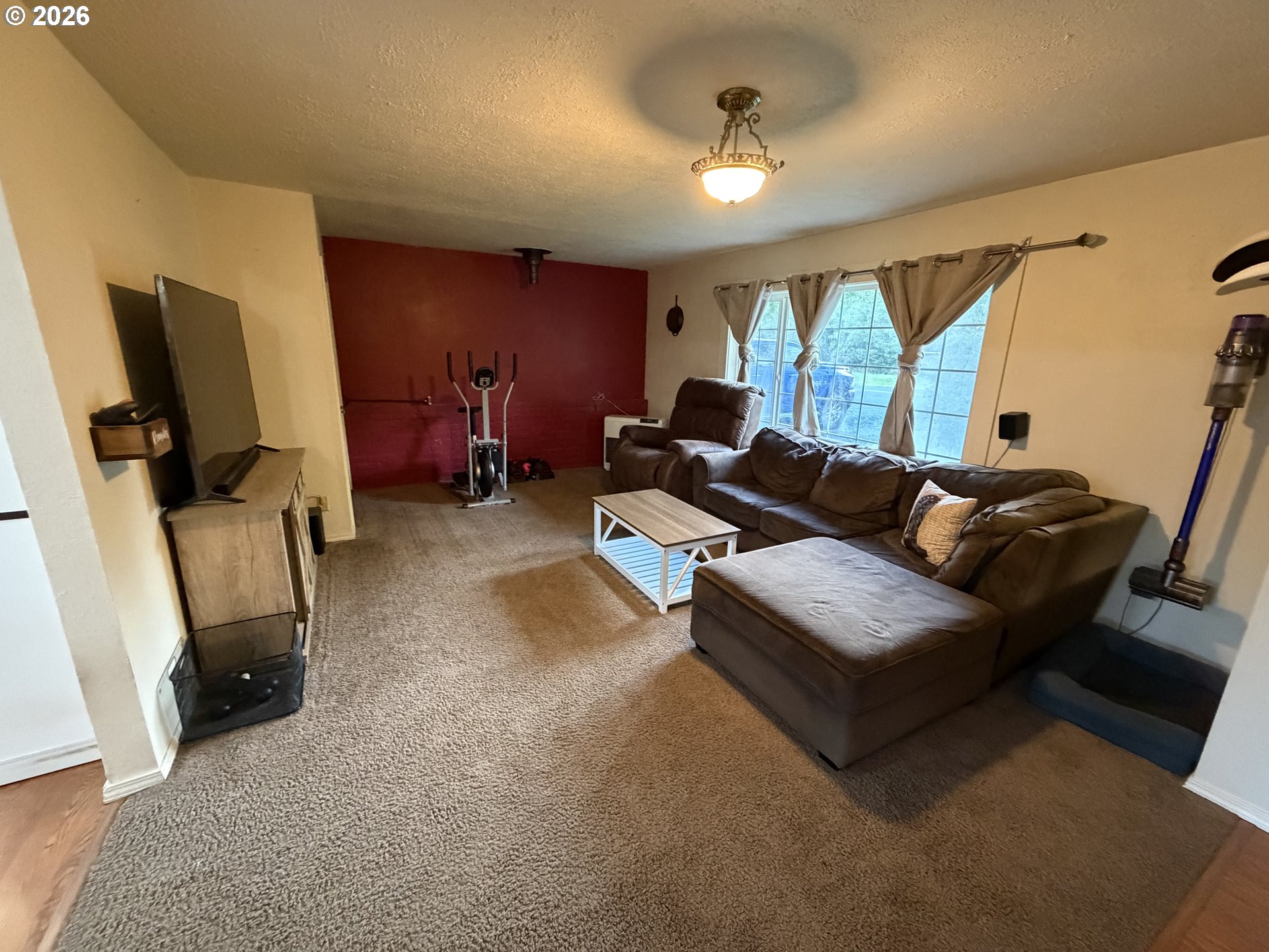 92738 Knapp Road Port Orford, OR 97465 - Photo 5 of 34 a living room with furniture and a flat screen tv