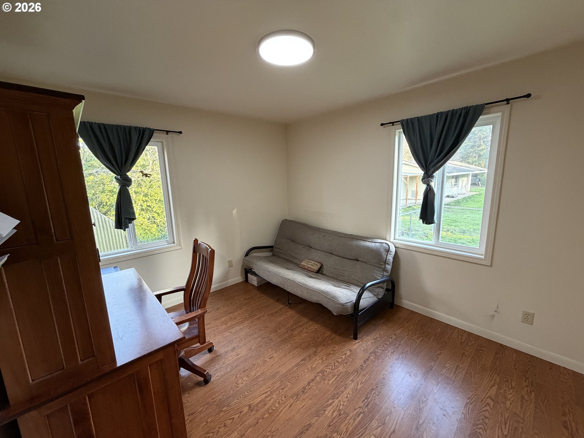 92738 Knapp Road Port Orford, OR 97465 - Photo 10 of 34 a living room with furniture and a window