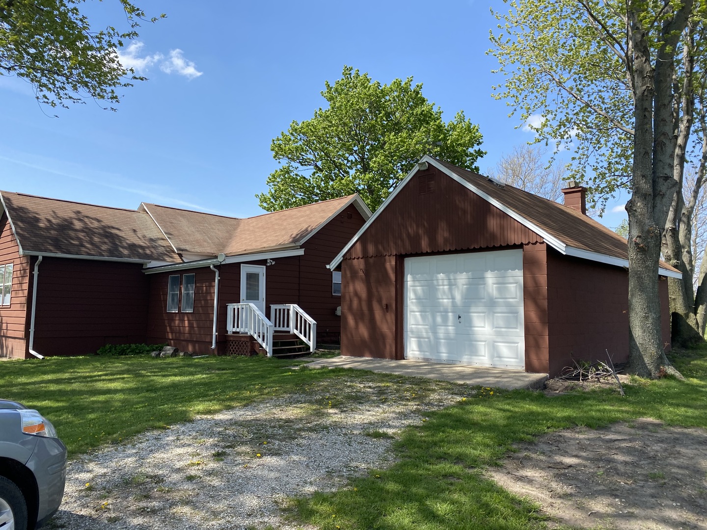 18240 Hurd Road Prophetstown, IL 61277 - Photo 14 of 18 a front view of house with a garden