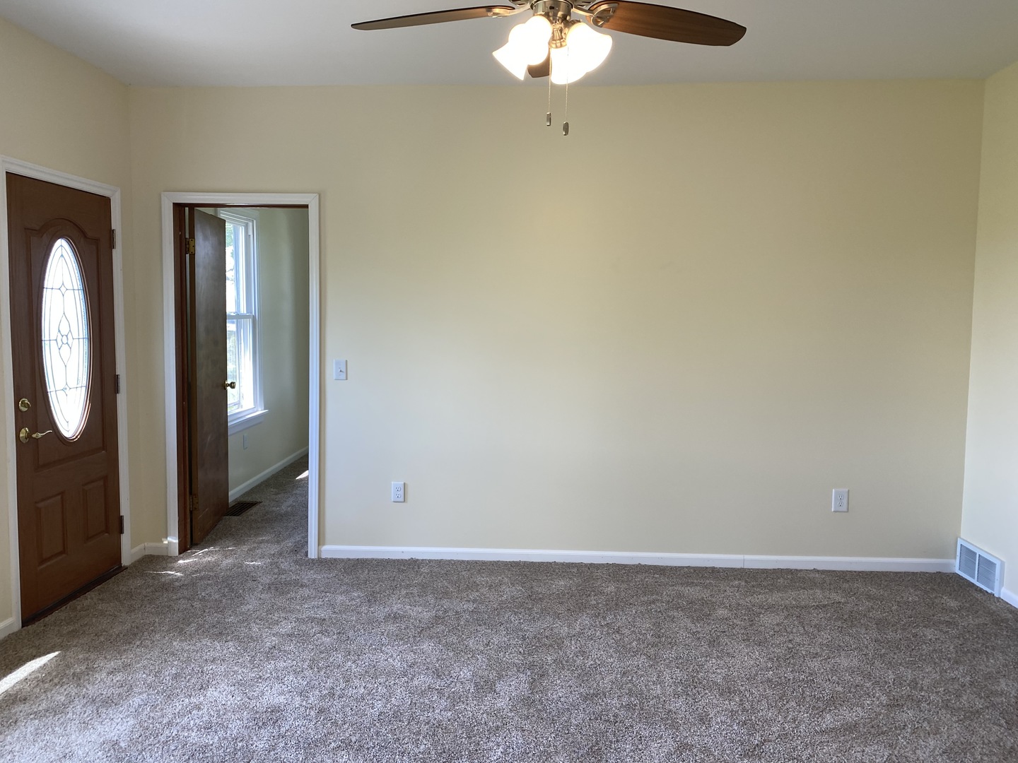 18240 Hurd Road Prophetstown, IL 61277 - Photo 6 of 18 an empty room with a mirror