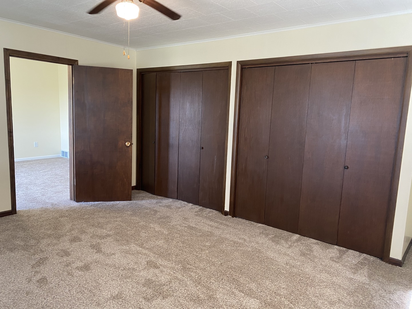 18240 Hurd Road Prophetstown, IL 61277 - Photo 9 of 18 a view of empty room with a chandelier fan