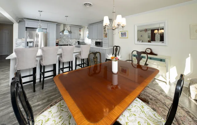 a view of a dining room with furniture