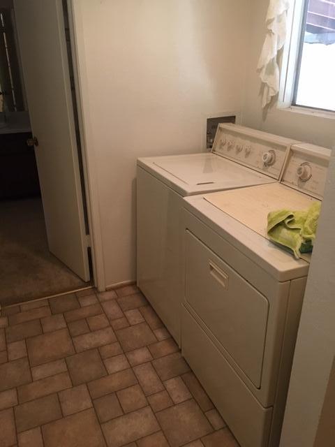 16235 Valley Ranch Road Santa Clarita, CA 91387 - Photo 12 of 24 a utility room with dryer and washer