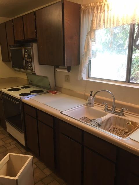 16235 Valley Ranch Road Santa Clarita, CA 91387 - Photo 15 of 24 a bathroom with a sink and a window