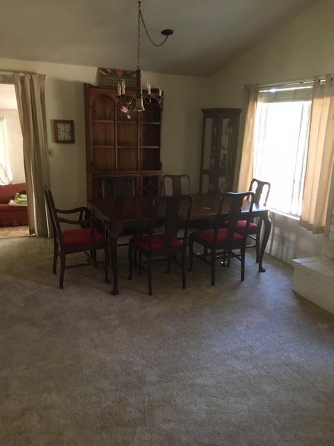 16235 Valley Ranch Road Santa Clarita, CA 91387 - Photo 17 of 24 a dining room with furniture and window