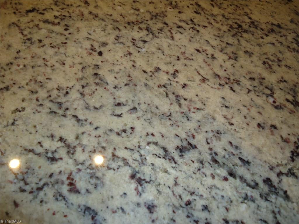 4573 Silo Ridge Clemmons, NC 27012 - Photo 14 of 27 Granite counter tops.