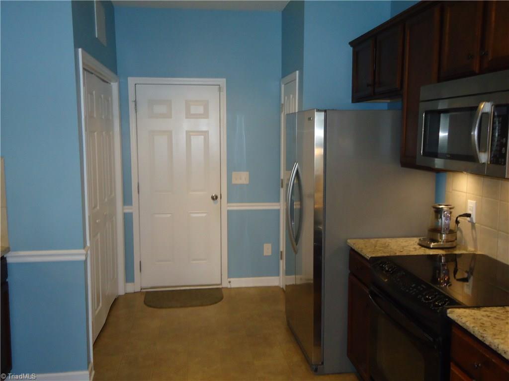4573 Silo Ridge Clemmons, NC 27012 - Photo 15 of 27 Entrance from garage into kitchen, making it so much easier to bring in groceries...