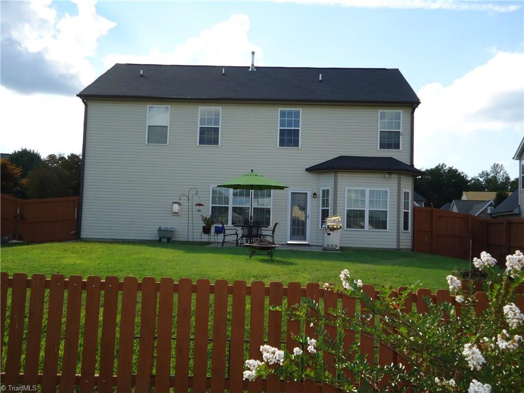 4573 Silo Ridge Clemmons, NC 27012 - Photo 5 of 27 Back yard. Nice fenced in back yard. Notice the bay window.