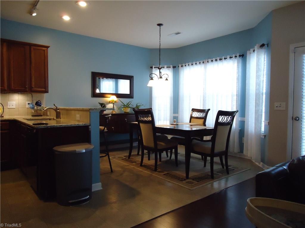 4573 Silo Ridge Clemmons, NC 27012 - Photo 9 of 27 Nice open kitchen/dining area with bay window.