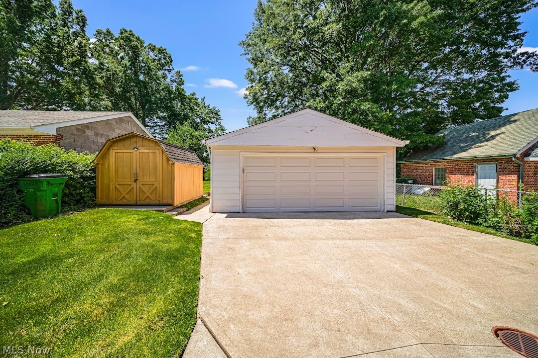 Garage with a lawn