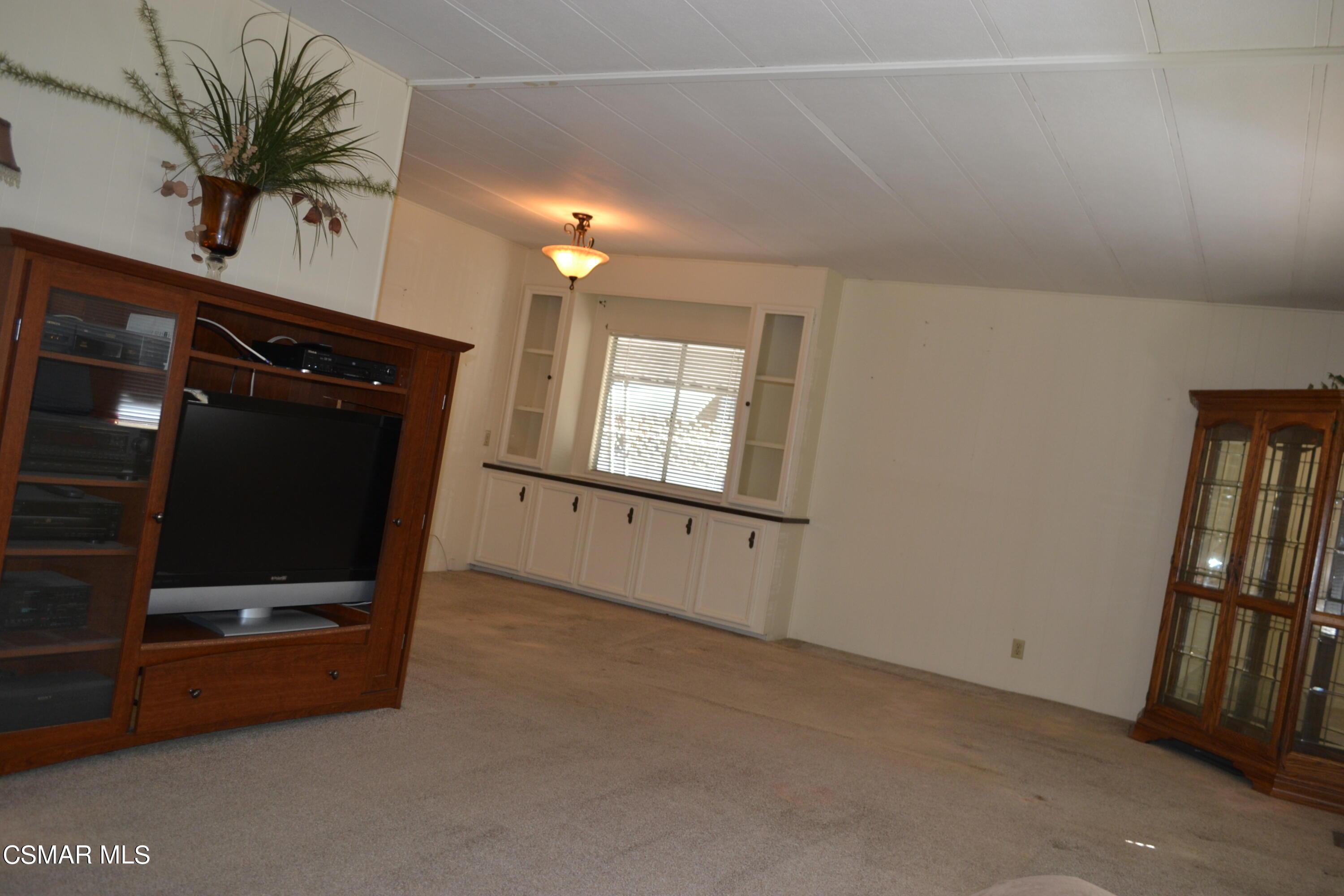 6480 Katherine Road, Unit 44 Simi Valley, CA 93063 - Photo 11 of 32 an empty room with windows