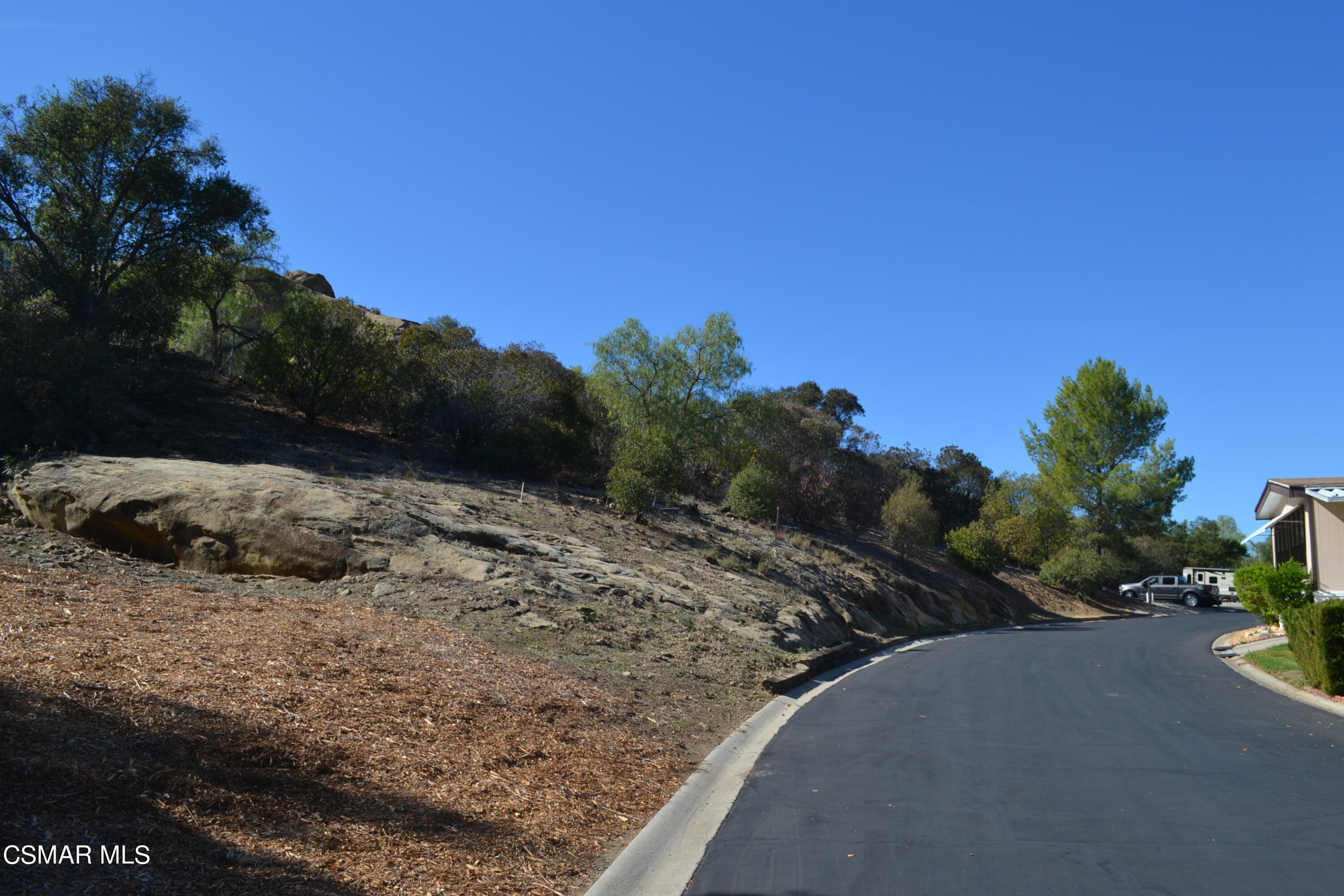 6480 Katherine Road, Unit 44 Simi Valley, CA 93063 - Photo 20 of 32 a view of a road with a snow on the side of the road